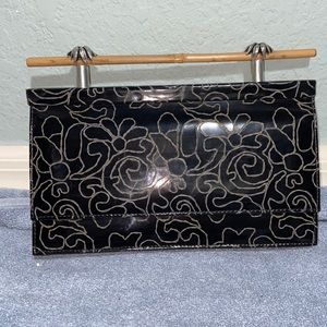 Rare Vtg Vicenza etched floral design Leather Clutch palm leaf bamboo handle bag